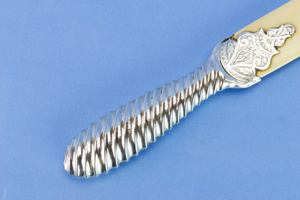 Sterling silver & Ivory page turner, 1890