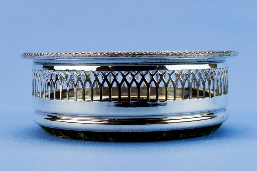 Silver plated bottle coaster, English mid 20th century