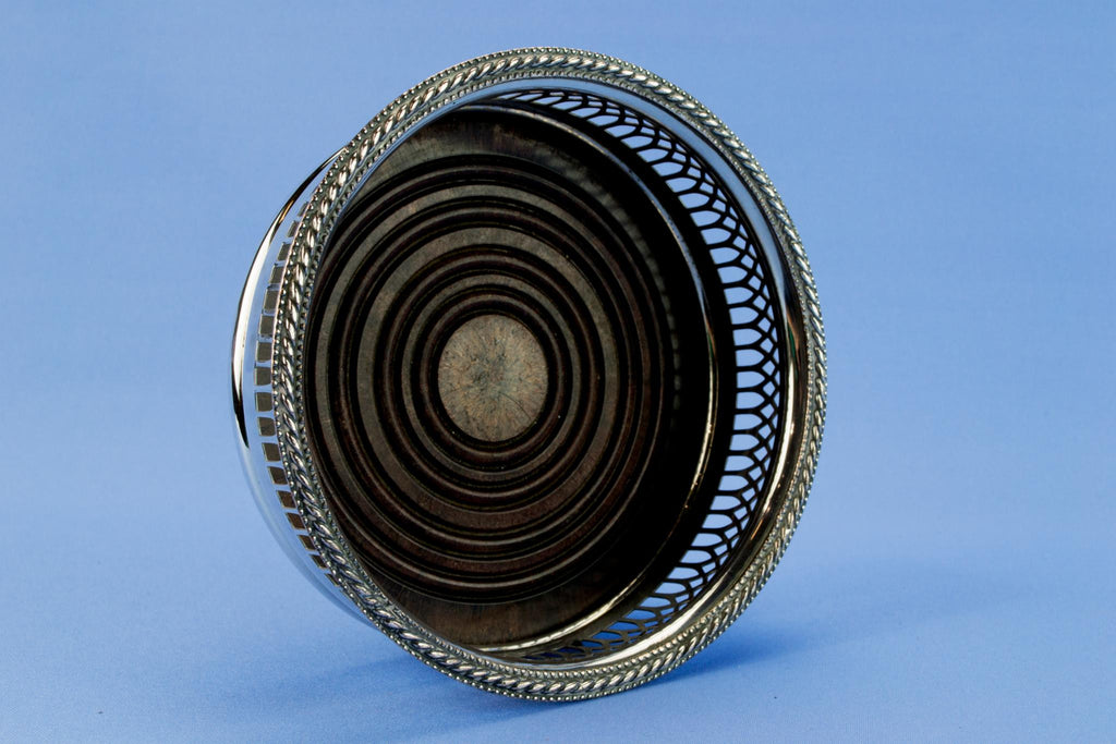 Silver plated bottle coaster, English mid 20th century