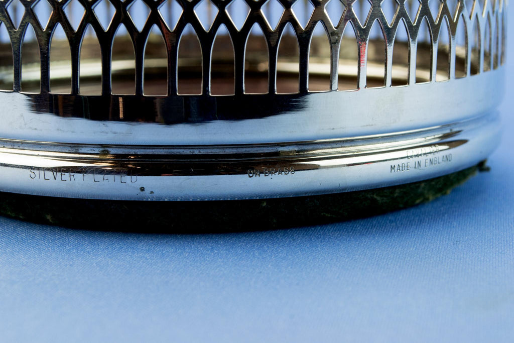 Silver plated bottle coaster, English mid 20th century