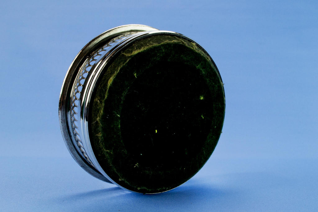 Silver plated bottle coaster, English mid 20th century