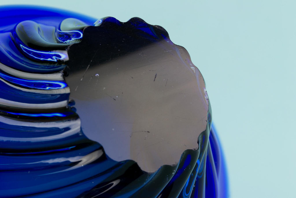 Blue glass decorative swirl bowl