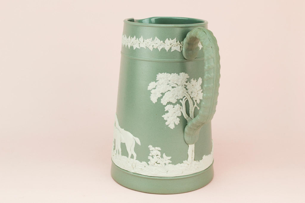 Green jasperware fox hunt jug, English early 1900s