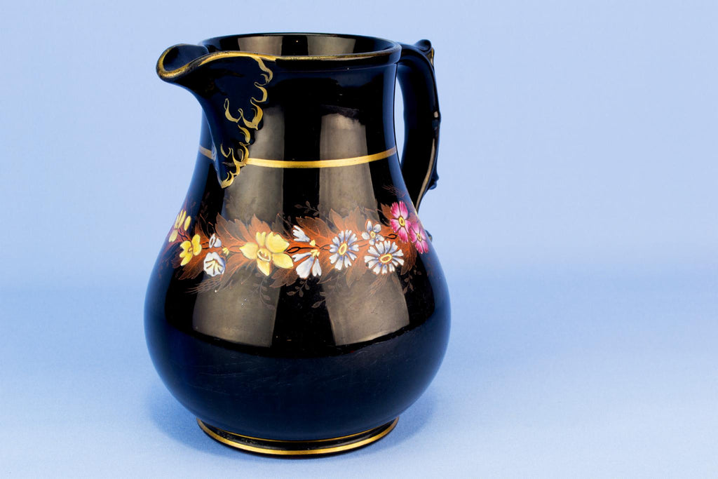 Black floral water jug, English 19th century