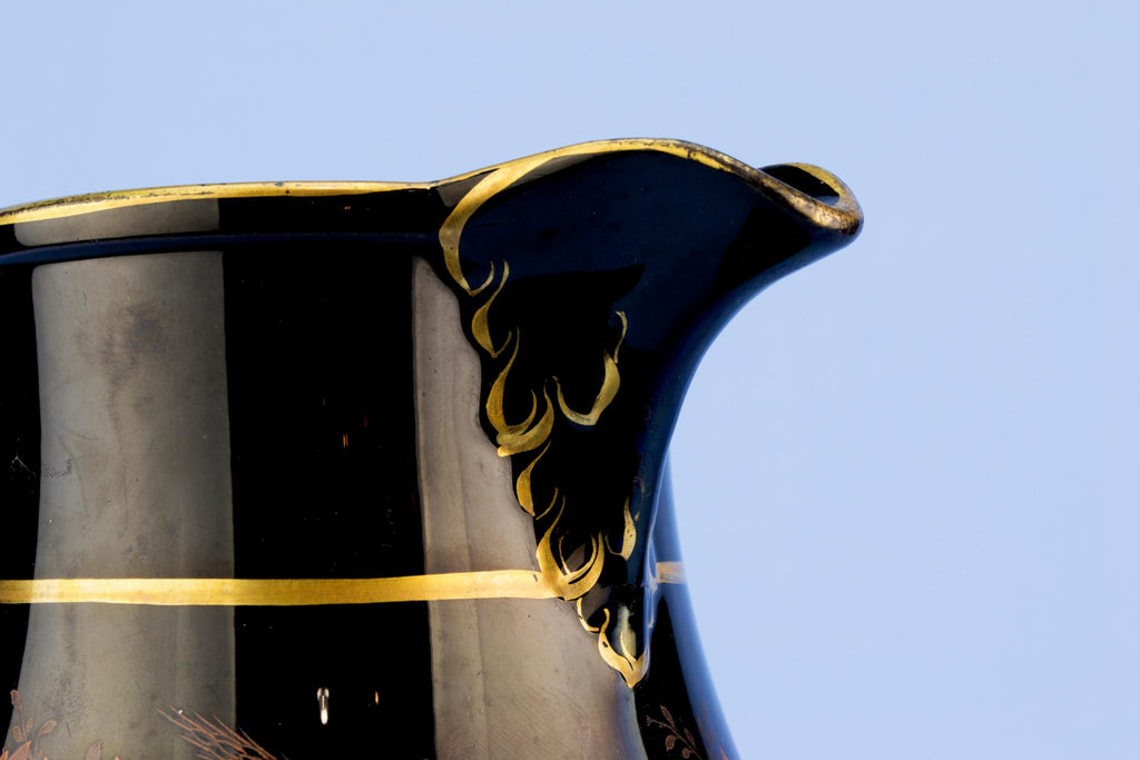 Black floral water jug, English 19th century