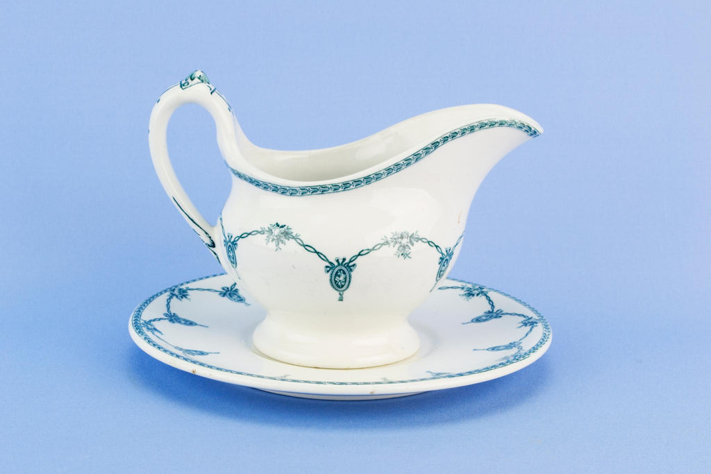 Blue and white gravy boat on plate, English 1920s