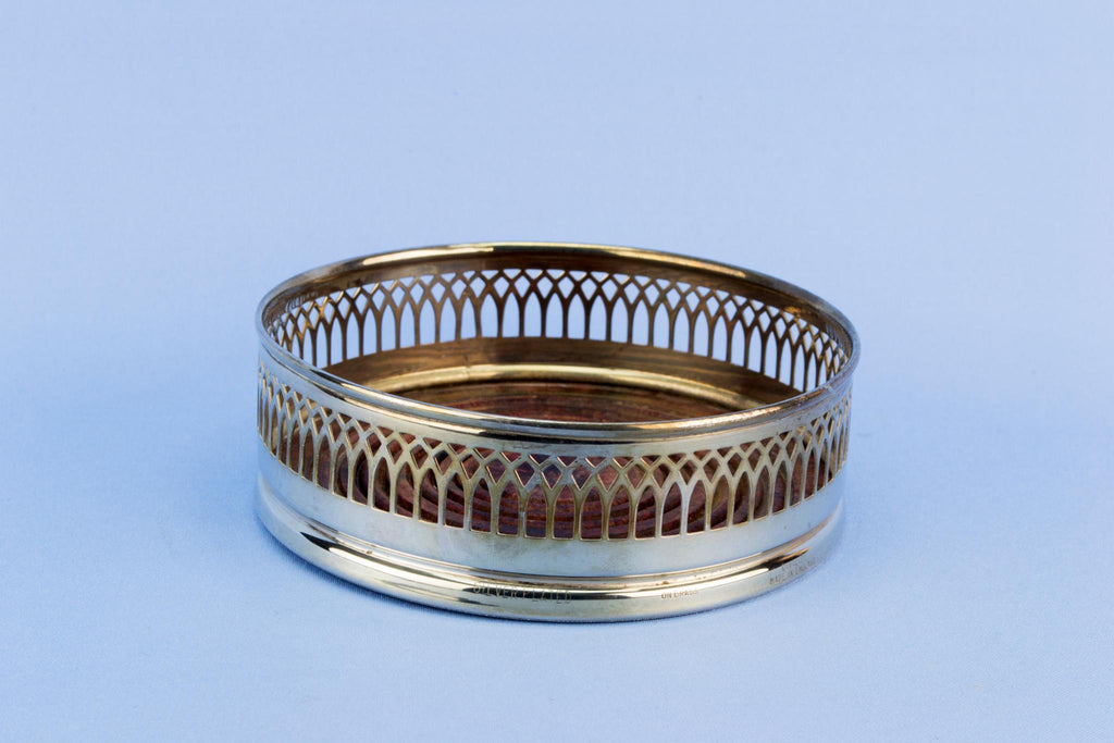 Silver plated bottle coaster, English mid 20th century