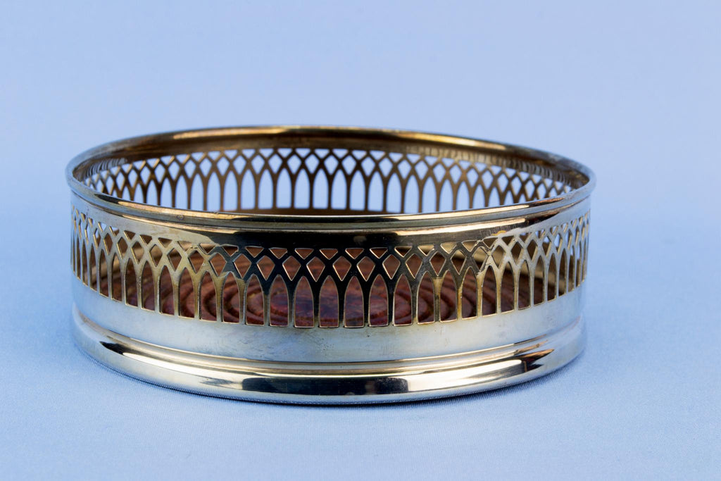 Silver plated bottle coaster, English mid 20th century