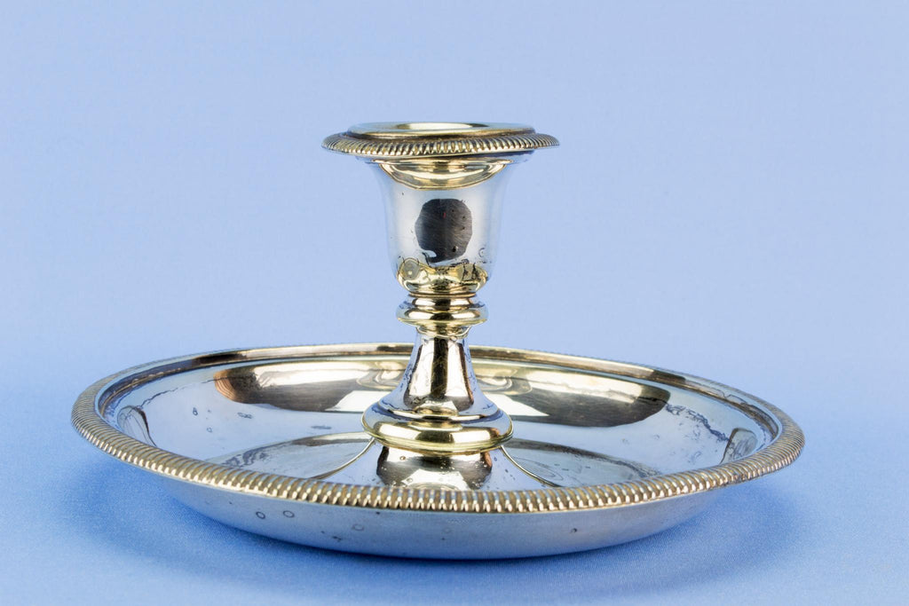 Silver plated table candlestick on a wide base, English early 1900s