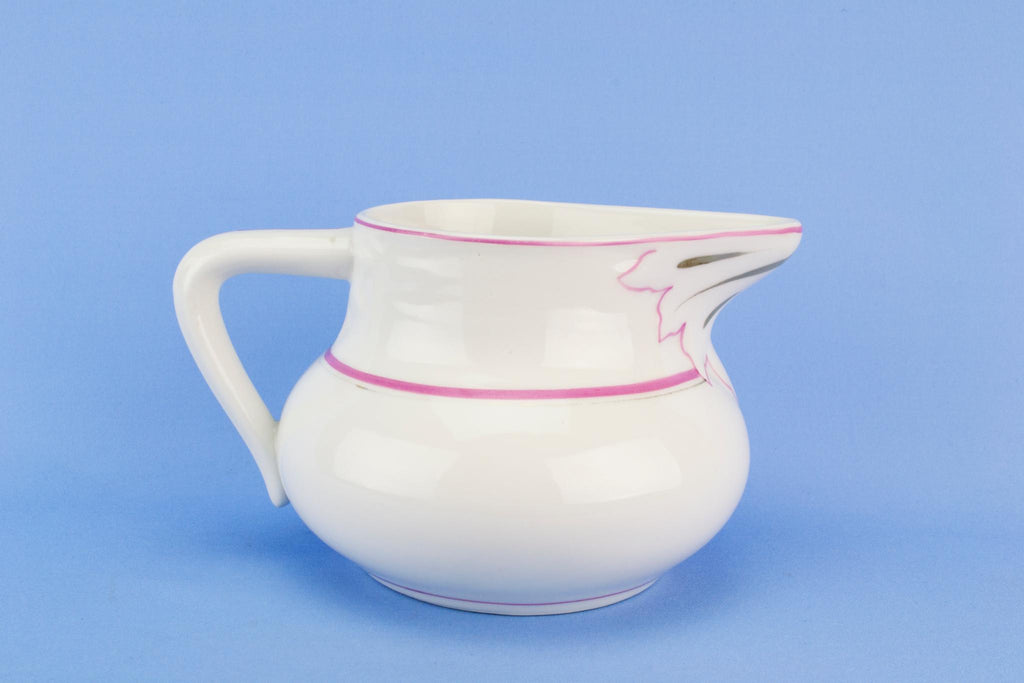 Medium pink and gilded jug, English early 1900s