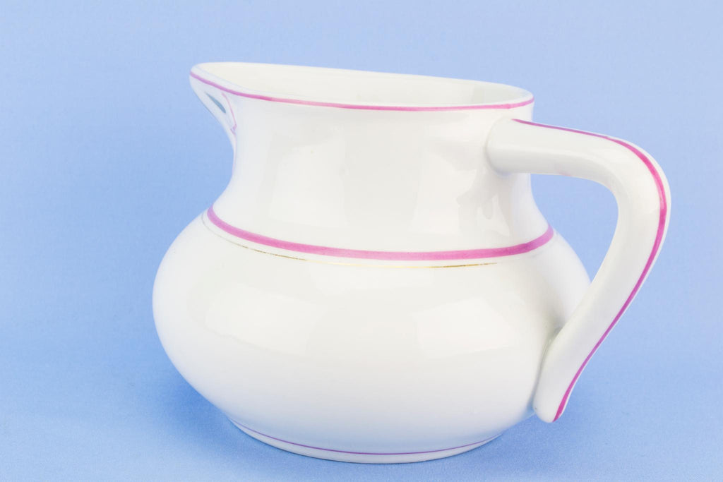 Medium pink and gilded jug, English early 1900s