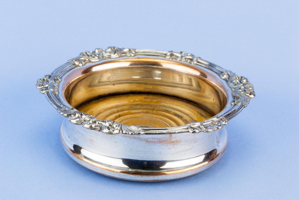 Silver plated bottle coaster, English mid 19th century