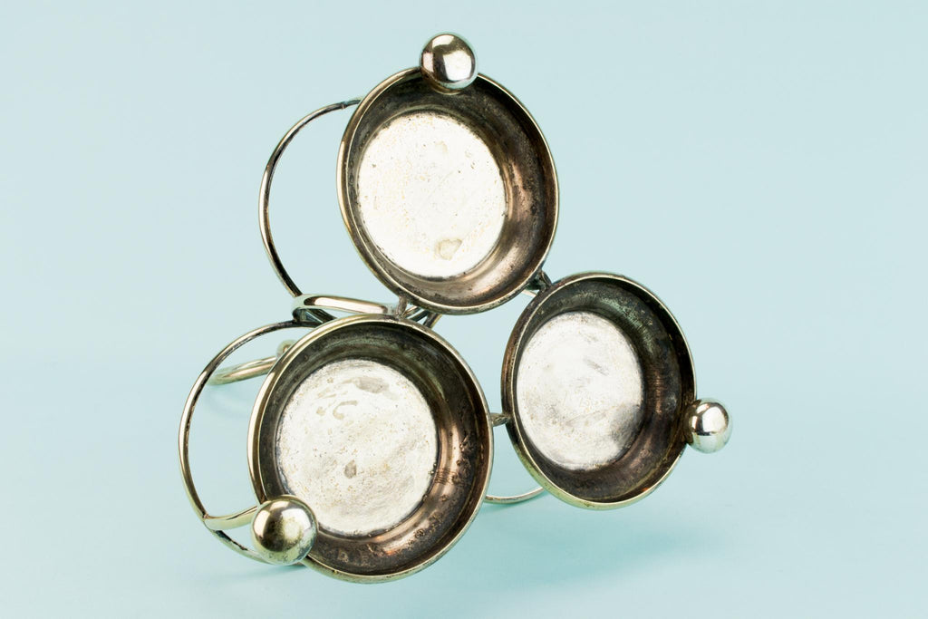 Three Colourful Decanters Set on a Stand, English 19th Century