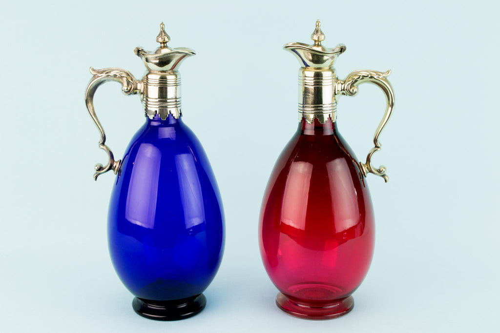 Three Colourful Decanters Set on a Stand, English 19th Century