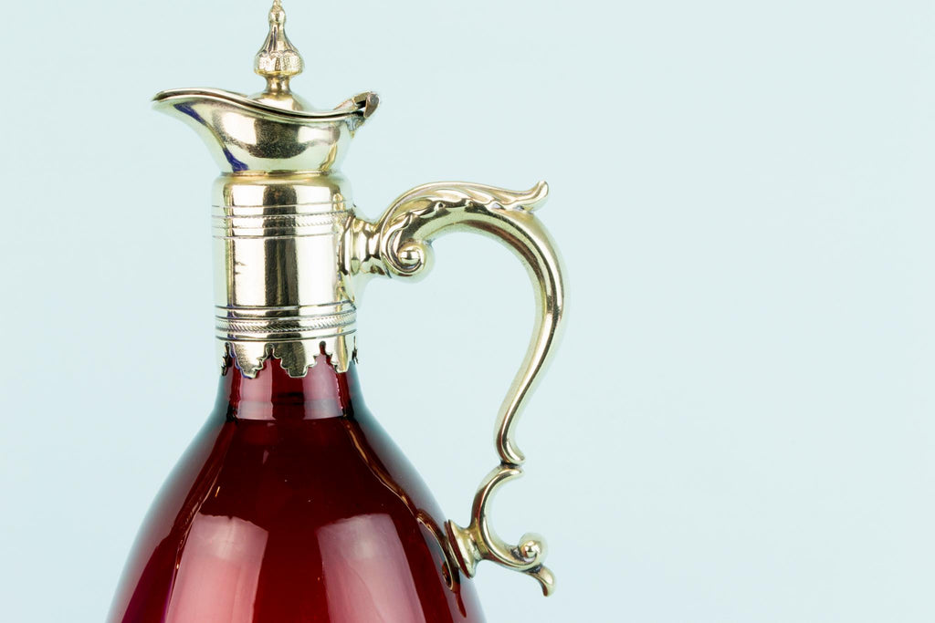 Three Colourful Decanters Set on a Stand, English 19th Century