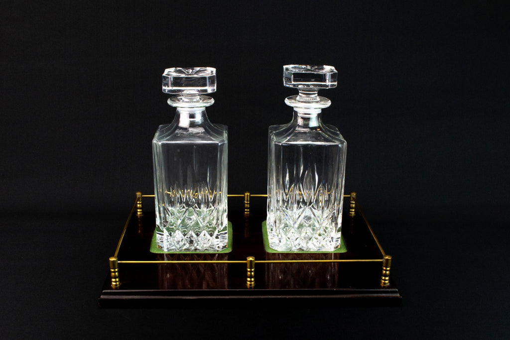 Two Decanters on A Wooden Stand