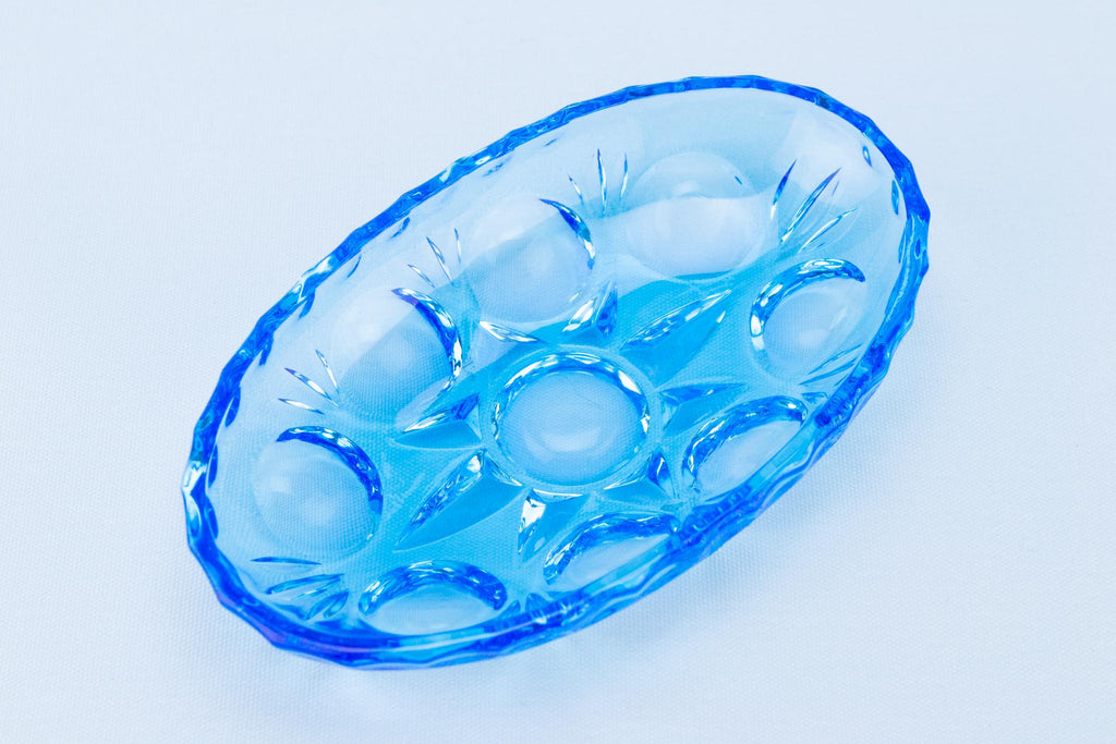 A set of 6 blue glass butter dishes, English 1950s