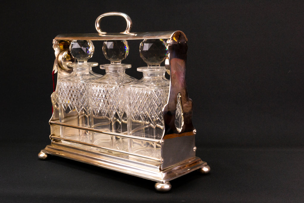 3 Decanters Tantalus, English 19th Century
