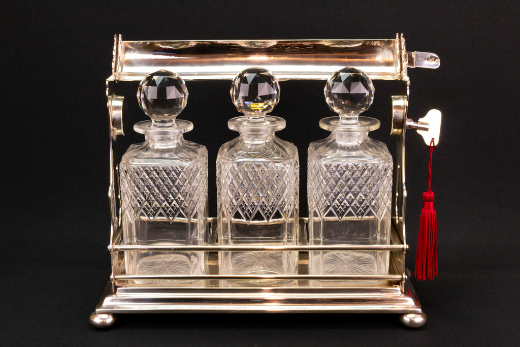 3 Decanters Tantalus, English 19th Century