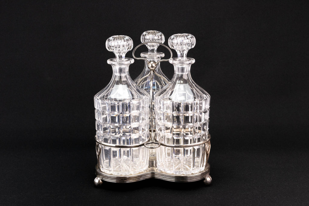 3 Glass decanters on stand, English Early 1900s