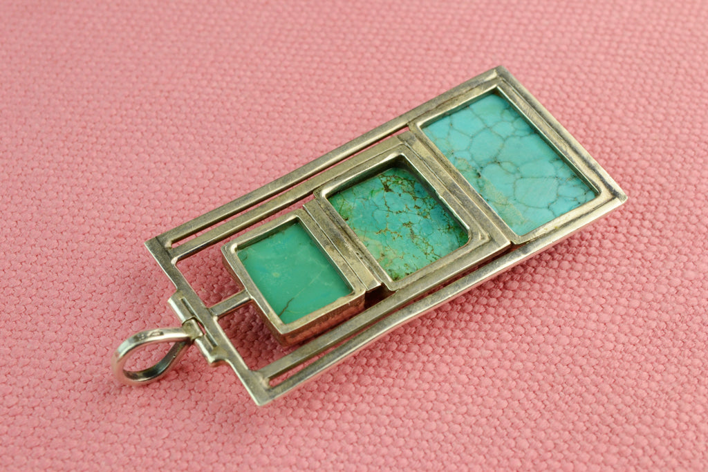 Pendant in Sterling Silver with Turquoise Stones