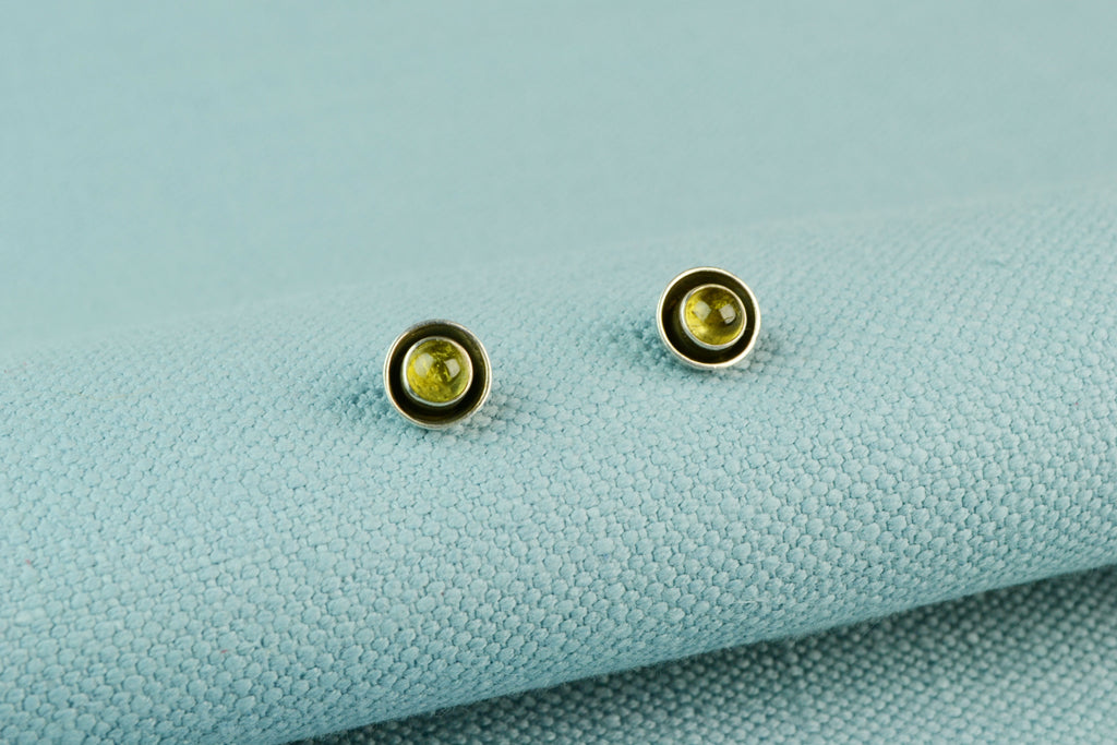 Stud Earrings in Silver Set with Green Gems