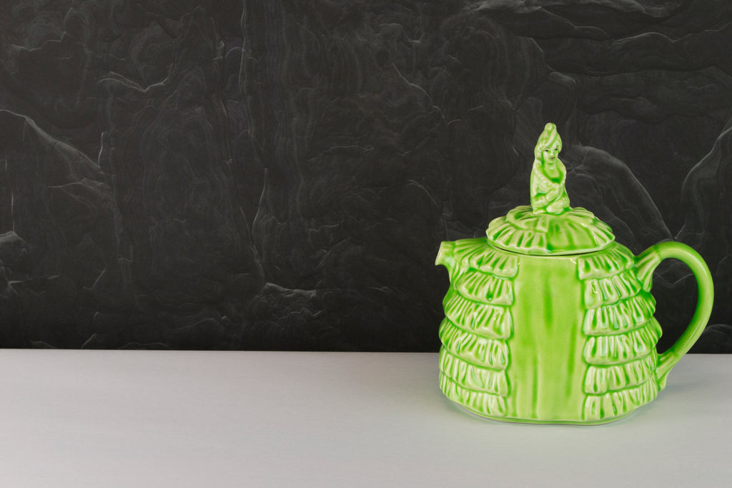 Green pottery teapot
